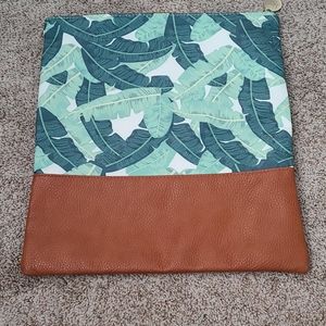 Island sole leaf print clutch
